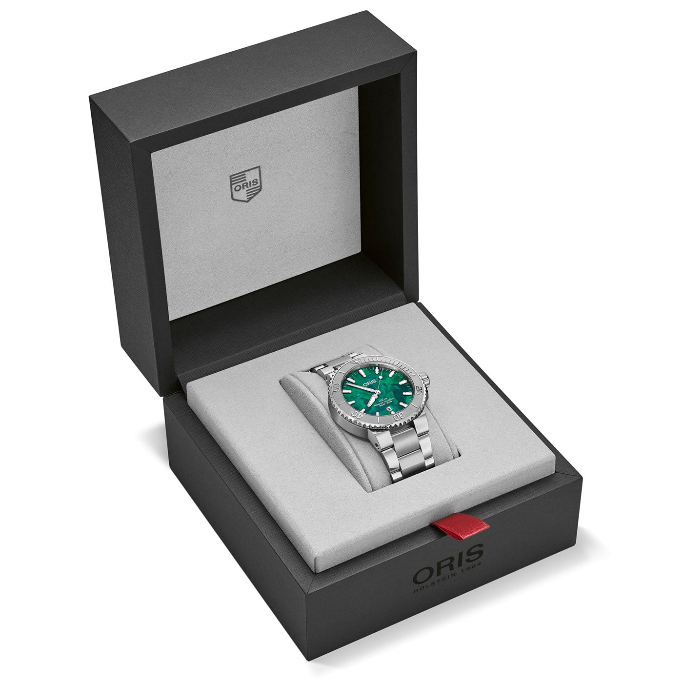 A luxury Oris Aquis X Bracenet Automatic 43.5mm watch featuring a green dial and silver band, elegantly displayed in an open black and gray ORIS-branded box. The watch and box are positioned at a slight angle, accentuating the exquisite design and packaging.
