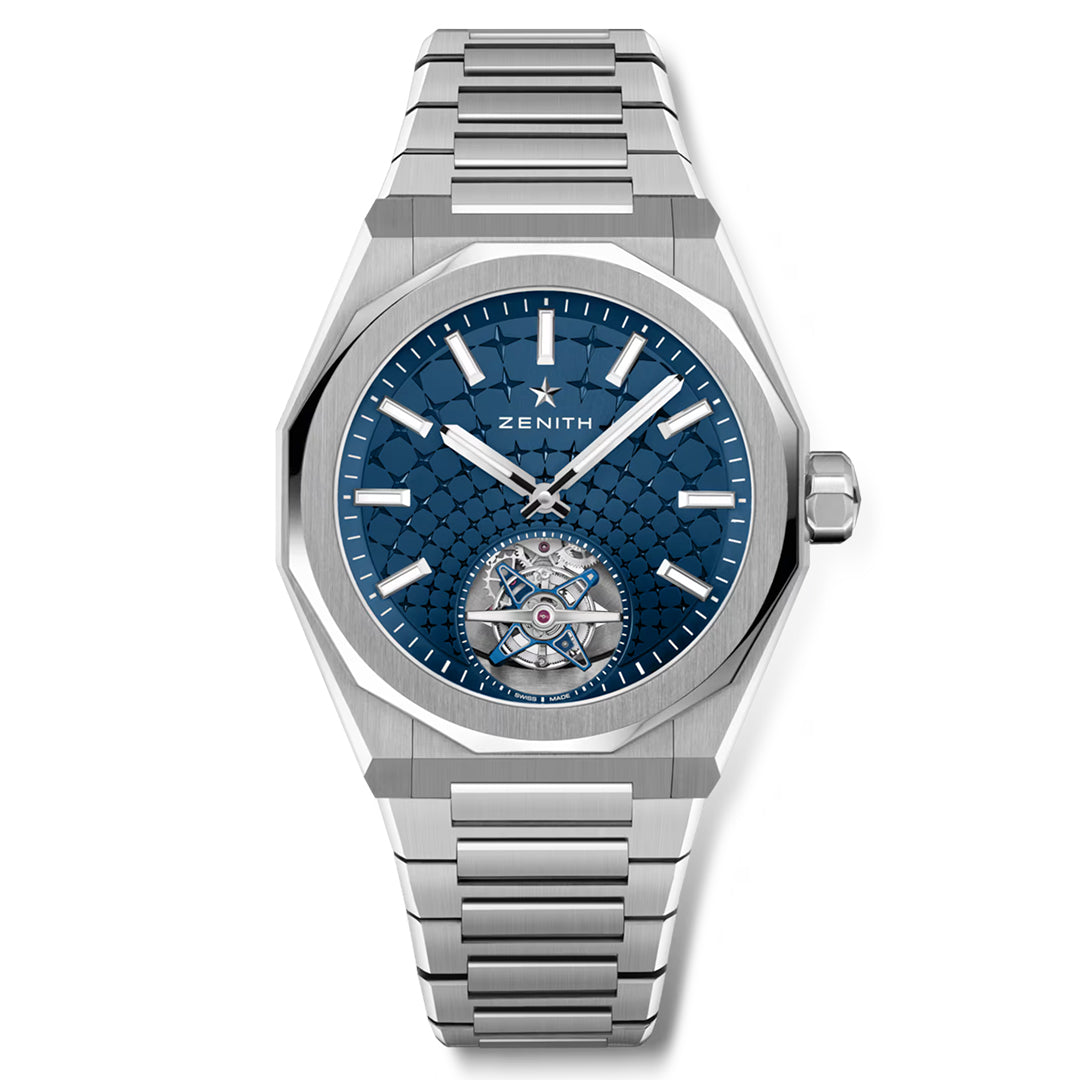 The ZENITH Defy Skyline Tourbillon El Primero 3630 41mm Watch by Zenith is a silver luxury wristwatch featuring a blue patterned dial, luminous white hour markers, and a visible tourbillon at 6 o'clock. It has high-frequency movement, a metal link bracelet with an interchangeable strap, and a star logo below the 12 o'clock position.