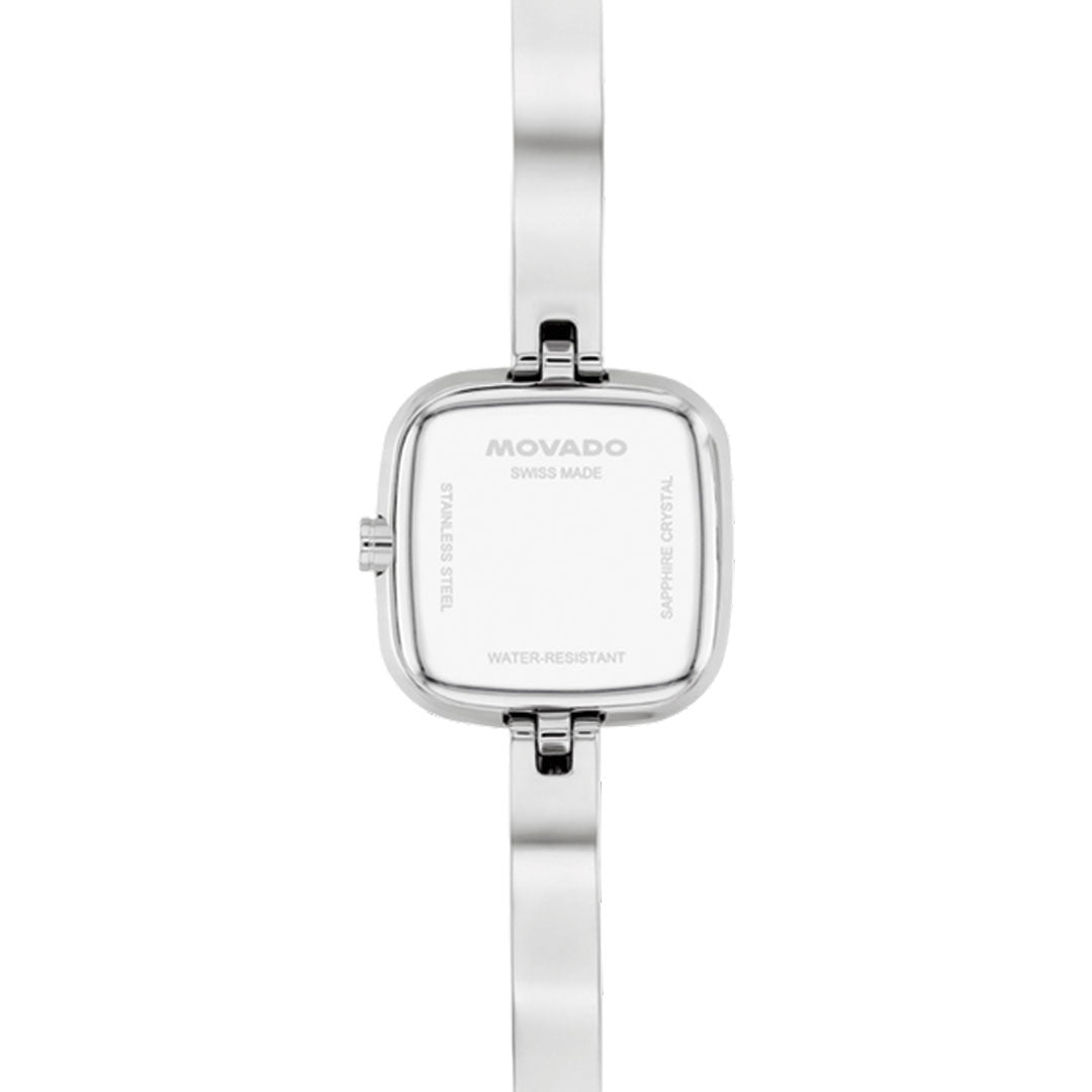 A close-up of the back of the Movado Museum Bangle Quartz 21.5mm Watch by Movado, featuring a square stainless steel case, sleek silver band, and engravings: "Swiss Made," "Stainless Steel," "Water-Resistant," and "Sapphire Crystal.