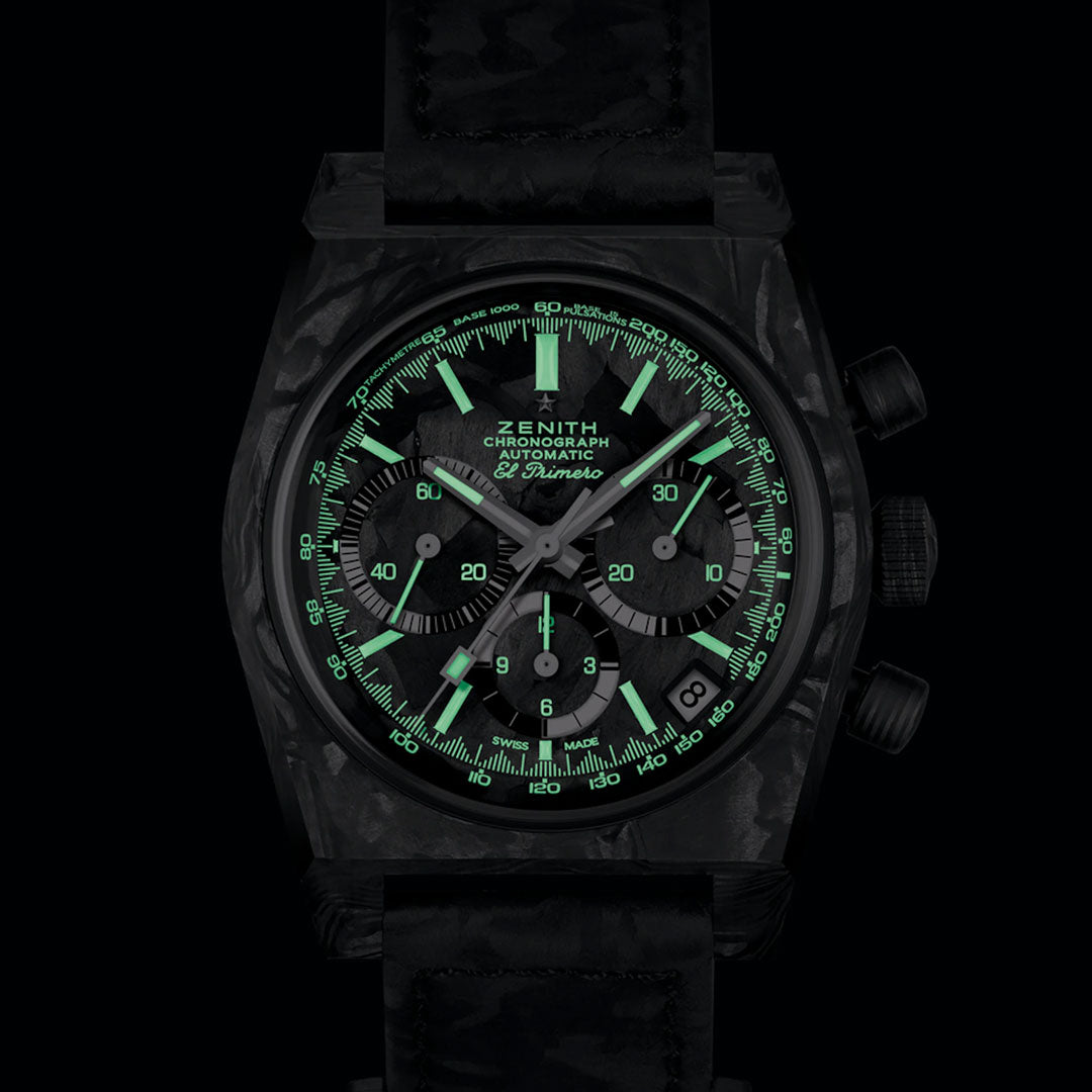 The ZENITH Chronomaster Revival El Primero 400 37mm Watch features a textured strap, luminous green markers, hands, and dial for night visibility, plus the "Zenith" logo at the top—an exclusive timepiece from Zenith.