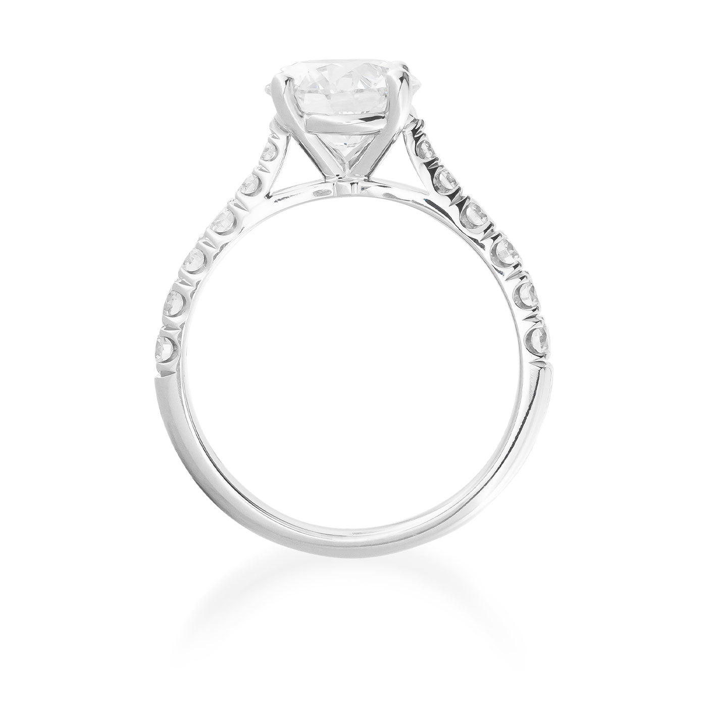 Side view of the Raffi&Co.® engagement ring featuring a lab-grown diamond in an 18K white gold band adorned with intricate scrollwork and mined accent diamonds, showcasing a classic and sophisticated style.