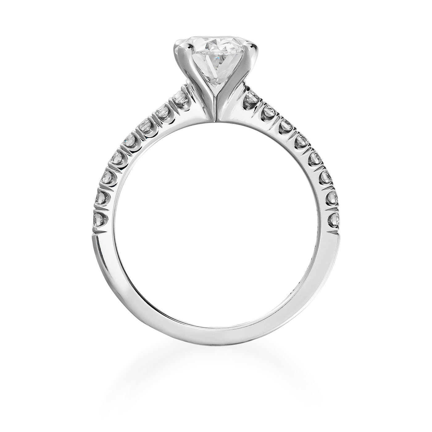 Discover the Raffi&Co.® 14K White Gold Oval Solitaire Lab Centre Diamond with Round Brilliant Mined Accent Diamond Engagement Ring. This stunning piece features a side-view of a large oval solitaire lab center diamond in a prong setting, complemented by small round diamonds that elegantly adorn the upper half of the shimmering band.