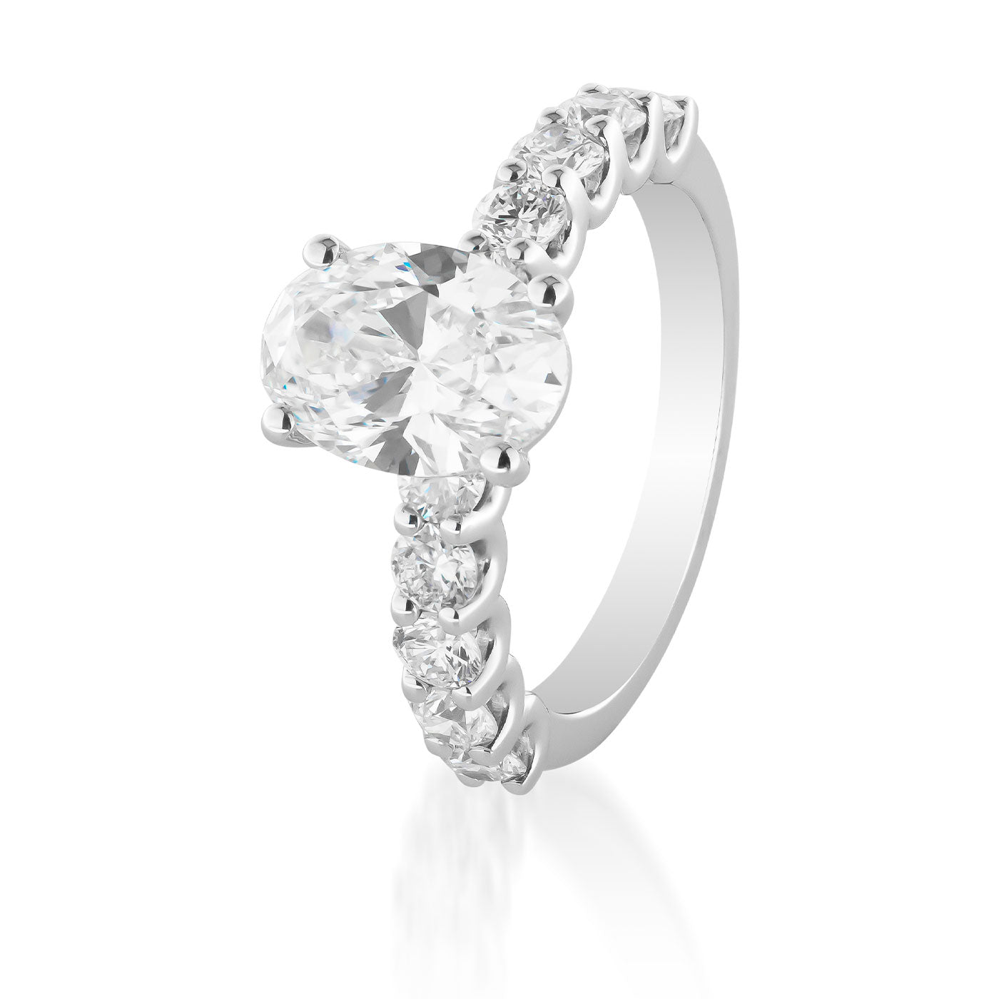 The Raffi&Co.® 14K White Gold Oval Solitaire Diamond Engagement Ring showcases a stunning 2.20 carat oval solitaire diamond at its center, enhanced by smaller round diamonds along the band. Presented elegantly against a plain white background, it embodies timeless sophistication and charm from Raffi&Co.