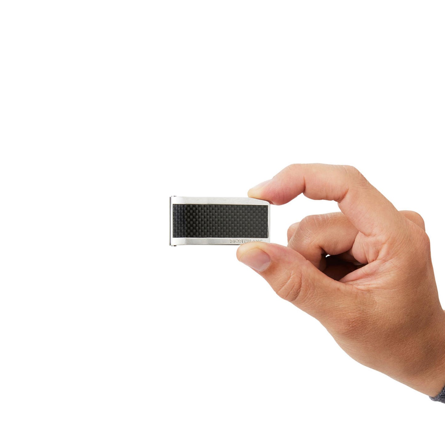 A hand is holding a sophisticated Montblanc Money Clip with a black front, set against a plain white background, evoking the elegance of the brand's design.