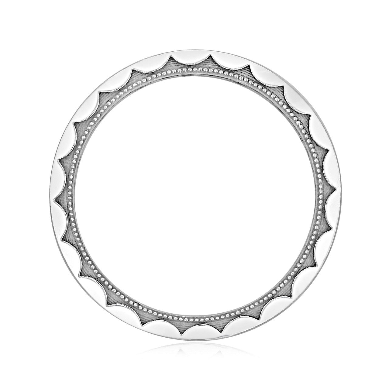 A circular 18K white gold frame from Tacori, showcasing an intricate design with scalloped edges and small dotted details that evoke the sculpted crescent motif of the Tacori Classic Men's Wedding Band. The interior remains unadorned, emphasizing the ornate border against a white backdrop.