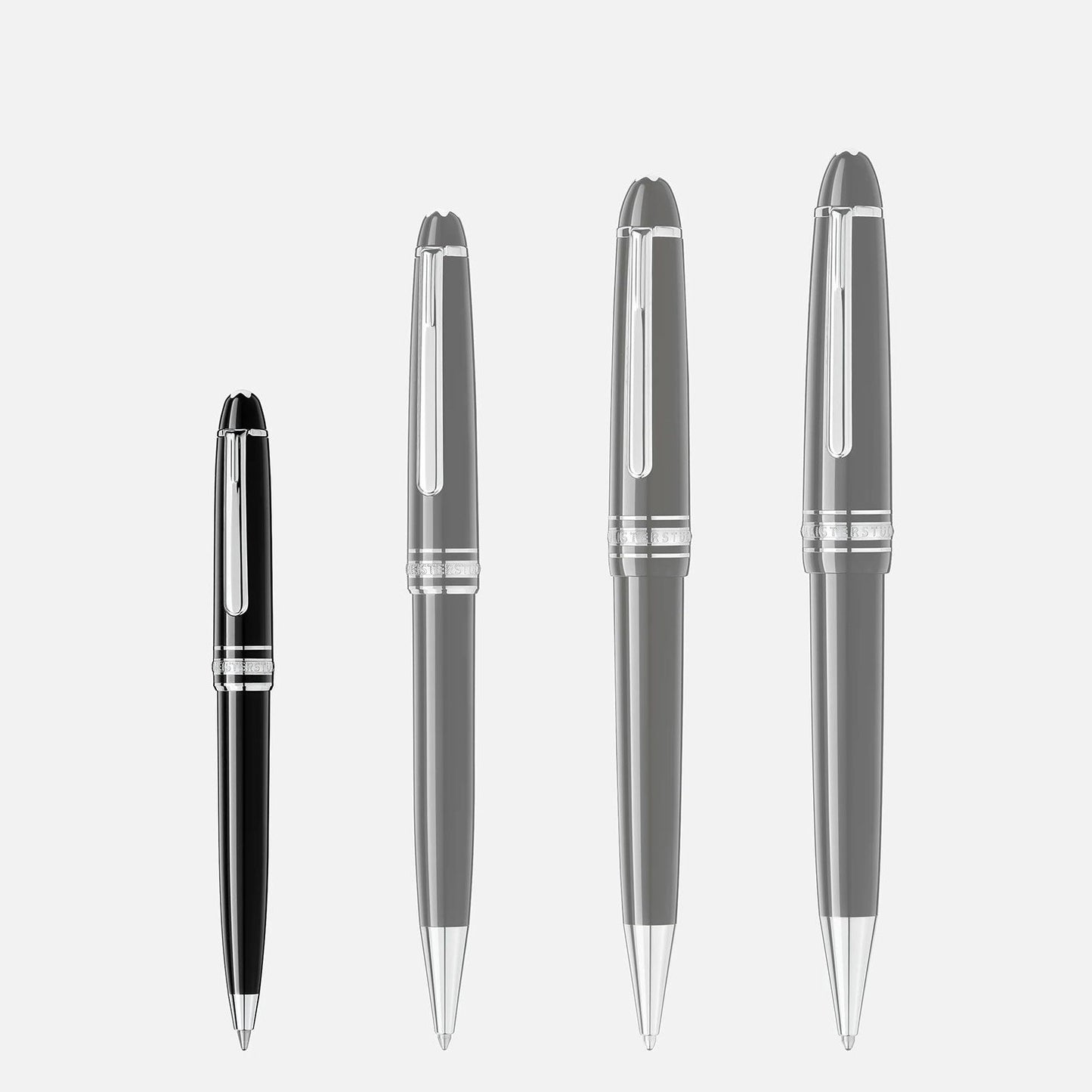 Four Montblanc Meisterstück Platinum Coated Mozart ballpoint pens are displayed against a white background, each slightly larger than the last. These luxury writing instruments from Montblanc feature a glossy black body with platinum-coated accents and caps, offering an impeccable touch of elegance.