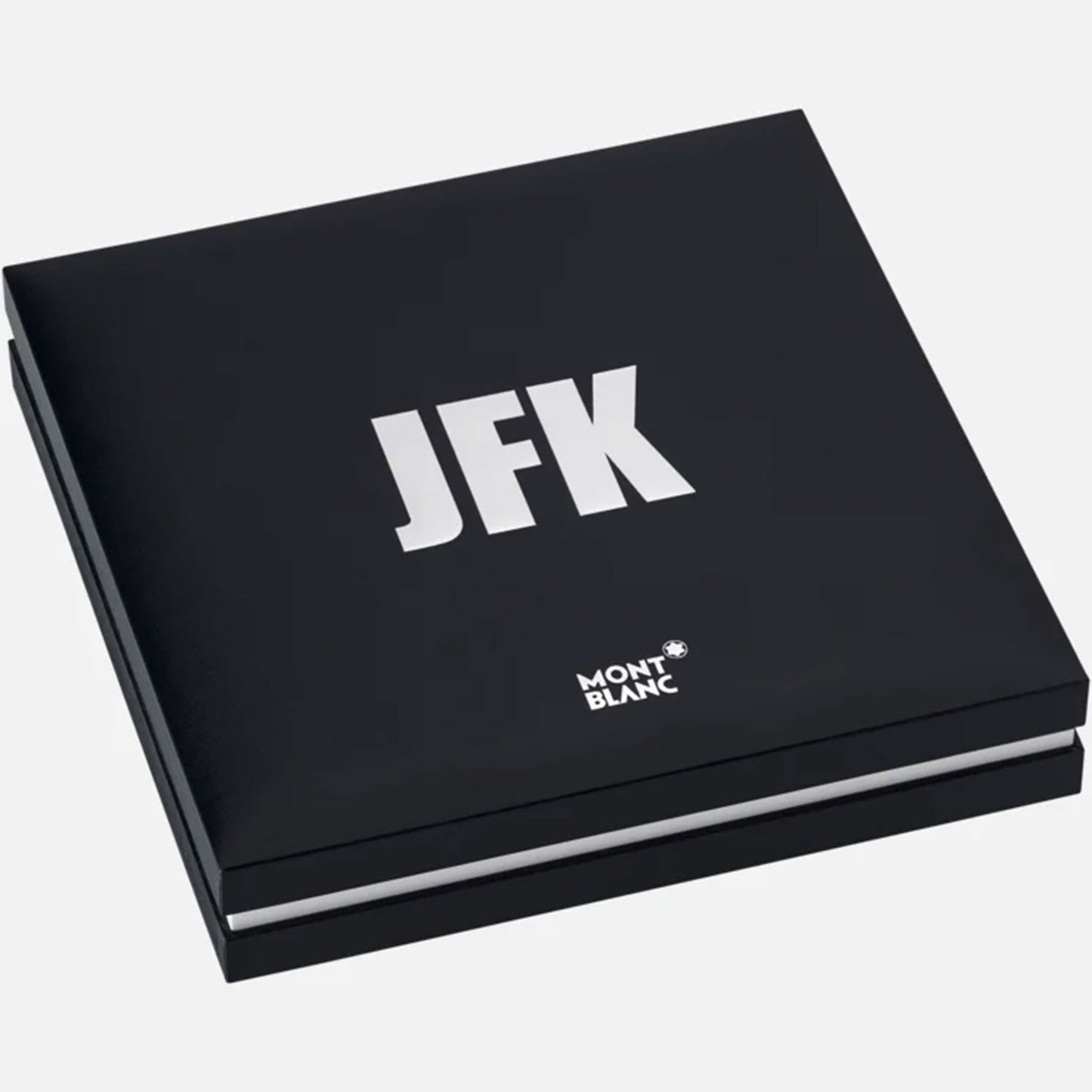 The Montblanc Great Characters John F. Kennedy Special Edition Ballpoint Pen comes in a black box with "JFK" prominently displayed in white on the lid. The Montblanc logo adorns the lower right corner, highlighting its Special Edition status. Set against a plain background, it's a homage to John F. Kennedy's legacy.