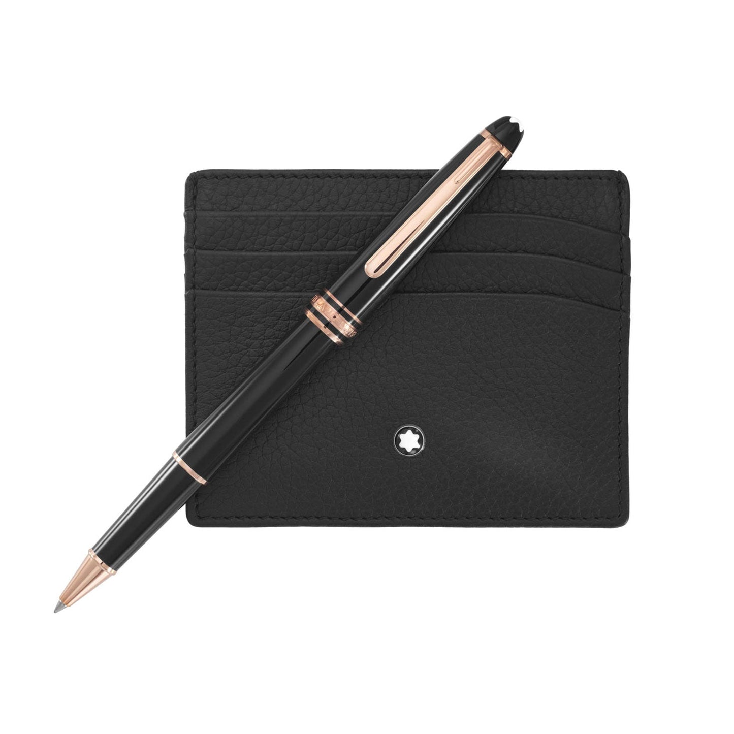 A black leather pocket holder with a small white star emblem is positioned upright. A sophisticated Montblanc Meisterstuck Black Rollerball Pen, featuring gold accents, is artfully placed diagonally across the holder on a simple white background.