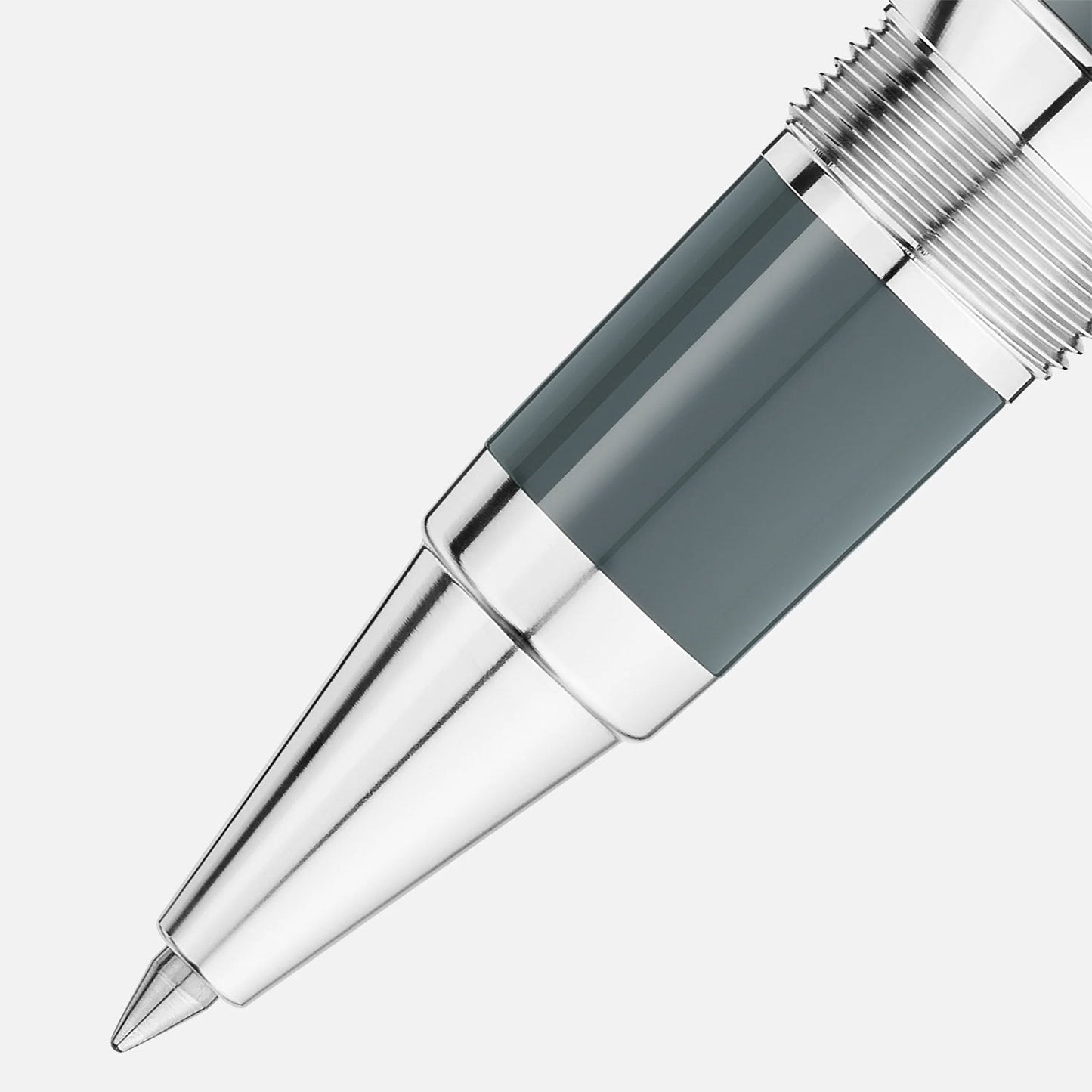 A close-up of the Montblanc Writers Edition Homage to Rudyard Kipling Limited Edition Rollerball Pen nib on a light background, highlighting its shiny metallic surface and modern design, capturing the classic sophistication of the Montblanc brand.