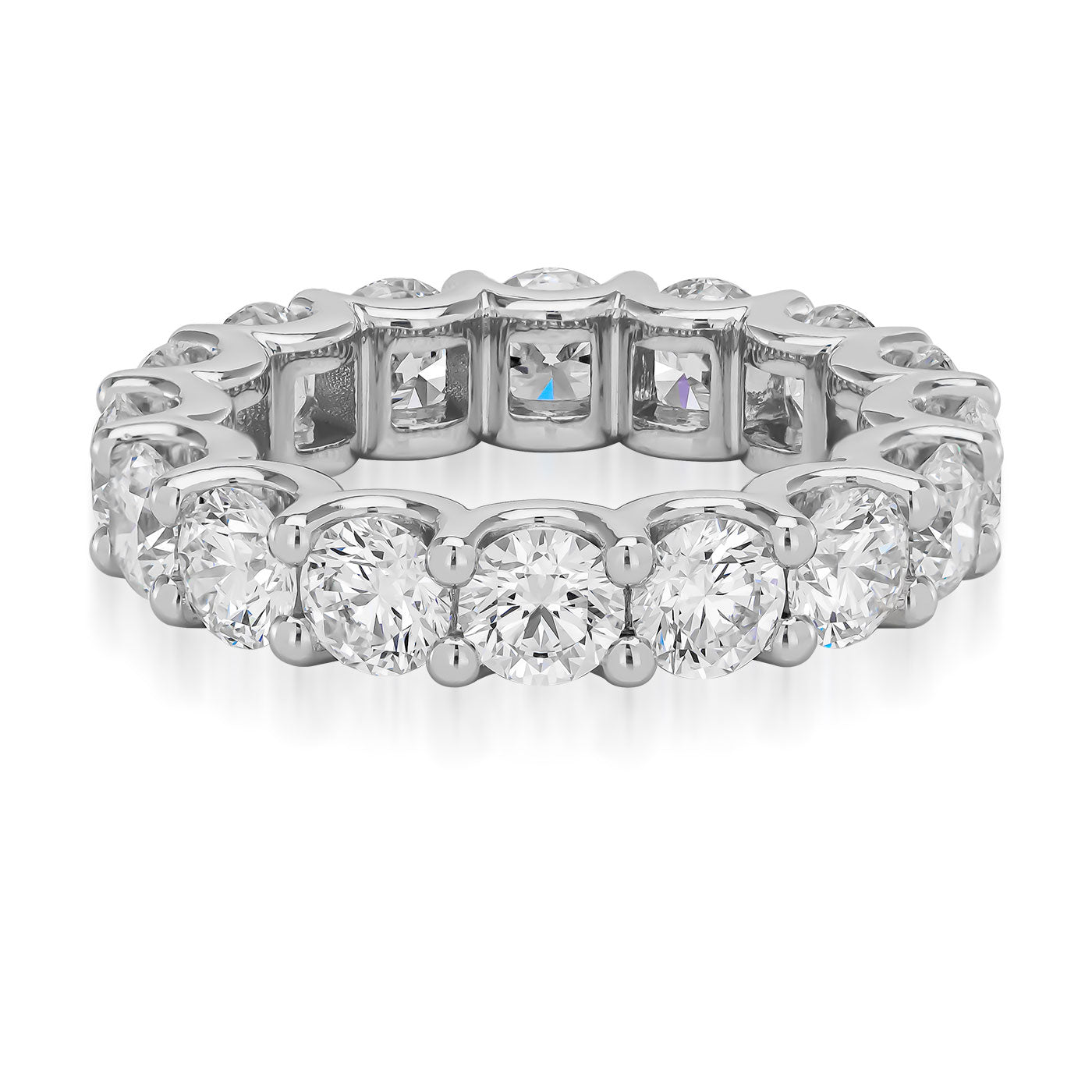 The Raffi&Co.® Signature 18K White Gold Round Brilliant Diamond Eternity Ring showcases a seamless circle of round, prong-set diamonds set in white gold against a plain white background.