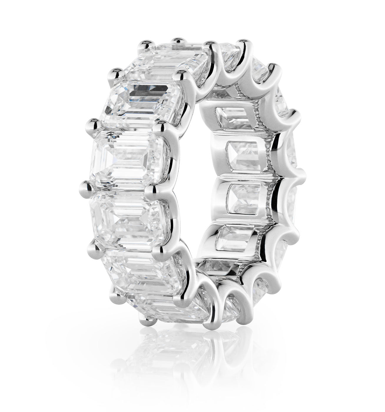 The Raffi&Co.® 14K White Gold Emerald Diamond Eternity Ring showcases sparkling emerald-cut diamonds in a continuous loop, offering luxury and brilliance in every detail.