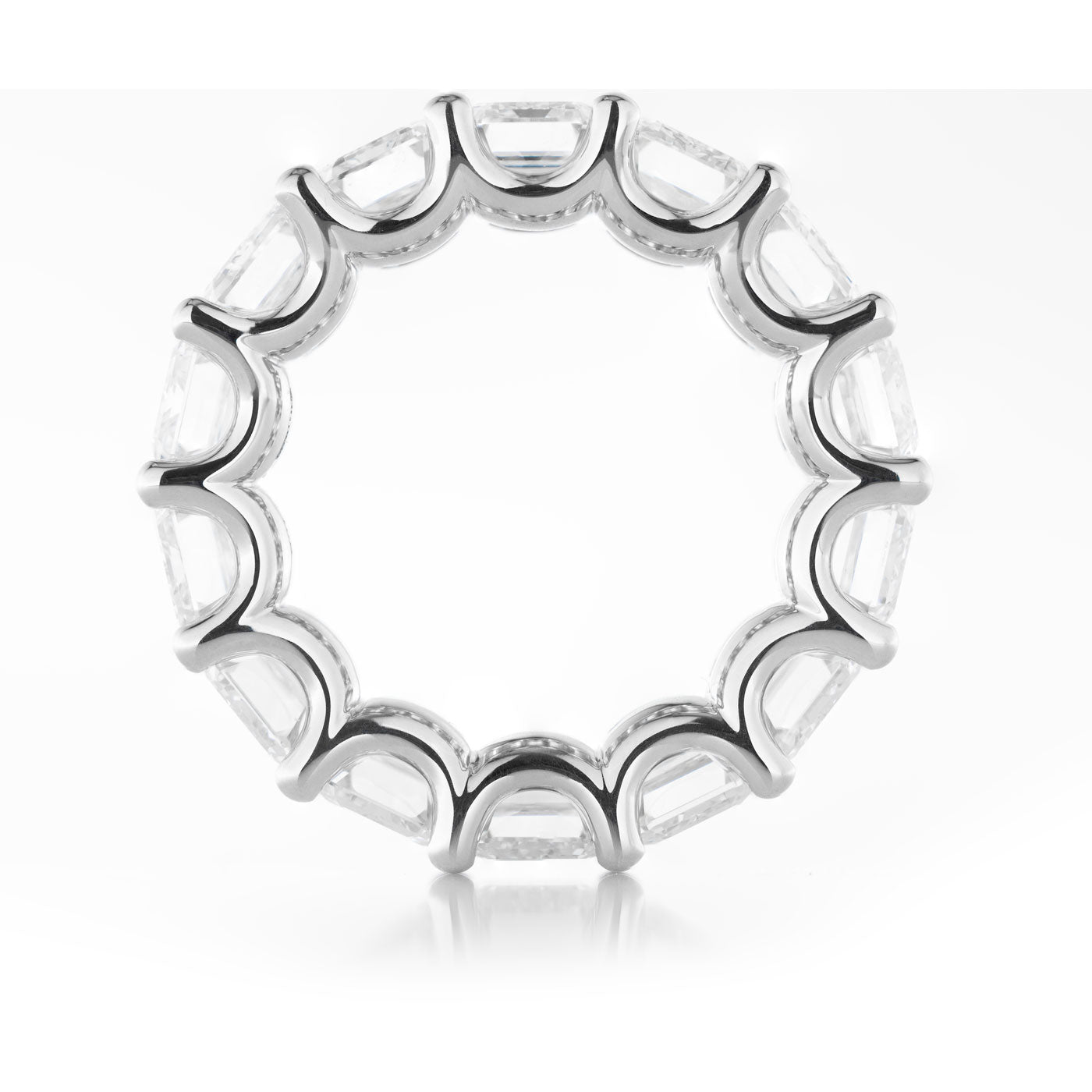 The Raffi&Co.® 14K White Gold Emerald Diamond Eternity Ring features emerald-cut diamonds in a continuous band, shown against a plain white background.