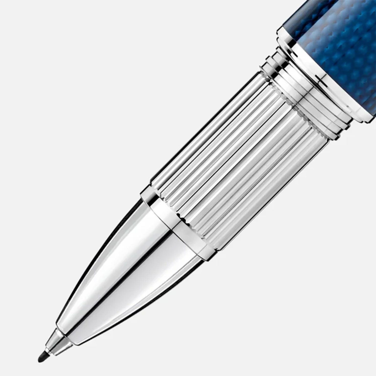 Close-up of a shiny silver and blue pen tip with intricate detailing against a plain white background. The Montblanc StarWalker Blue Planet Metal Fineliner Pen features a ribbed grip section, highlighting its elegant design and platinum-coated cap inspired by the wonders of space exploration.