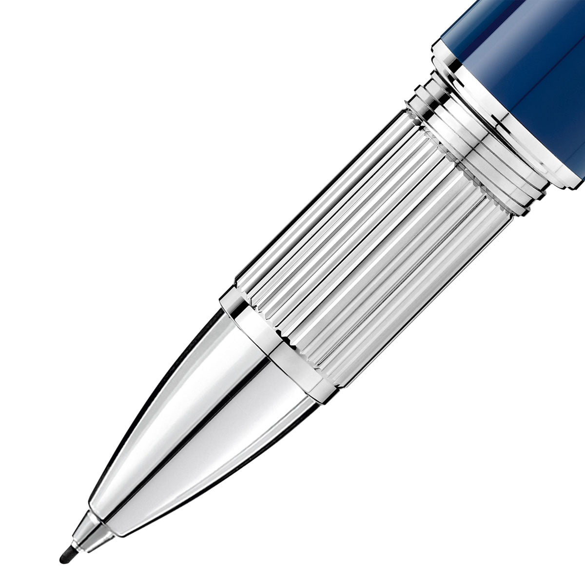 Close-up of a gleaming fountain pen nib with a ribbed grip section on a white backdrop, showcasing the elegant design and craftsmanship of the Montblanc StarWalker Blue Planet Precious Resin Fineliner Pen.