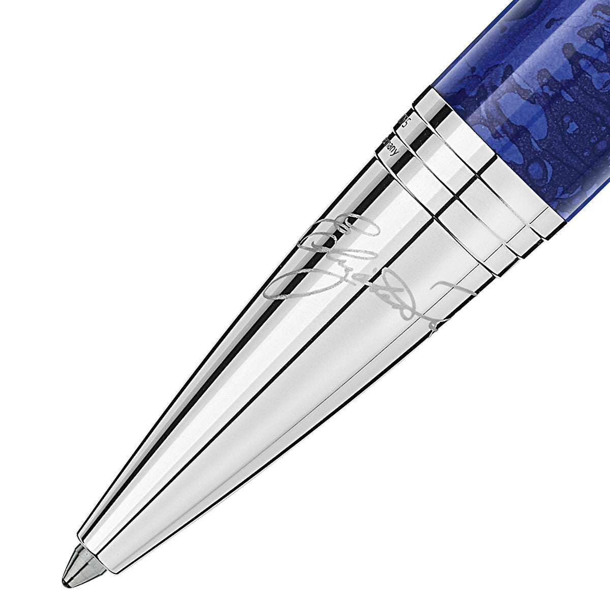 A close-up of the Montblanc Muses Elizabeth Taylor Special Edition Ballpoint reveals its sleek blue and silver design with a metallic, reflective tip. This Montblanc pen showcases a polished silver band and engraved details, exuding an elegant and professional appearance.