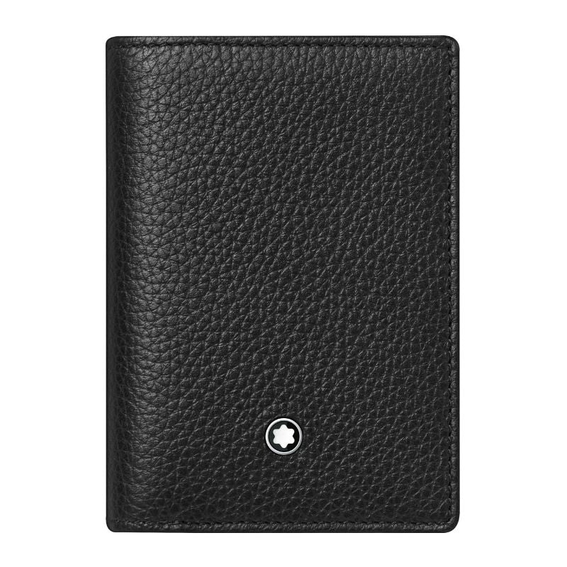 The Montblanc Meisterstück Soft Grain Leather Business Card Holder with Bill Compartment is crafted from soft grained leather. It features a textured black surface and a small round emblem displaying a white star outlined in black, centrally positioned near the bottom.
