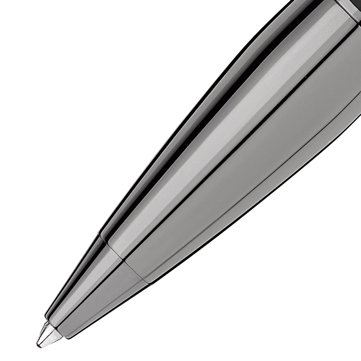 A close-up view of the tip of a sleek Montblanc StarWalker UltraBlack Dou Ballpoint Pen against a white background. The pen features a smooth, glossy finish with platinum-plated accents, showcasing its modern design.