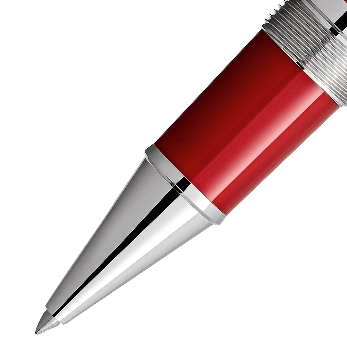 Close-up of the Montblanc Great Characters Enzo Ferrari Special Edition Rollerball Pen, showcasing its chrome-plated tip and glossy red and silver body inspired by Scuderia Ferrari. The pen is set against a white background, emphasizing its sleek and modern design.