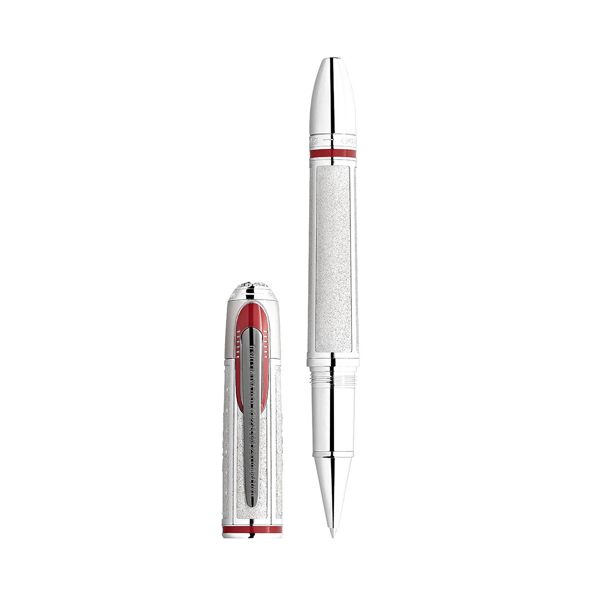 The Montblanc Great Characters Enzo Ferrari Limited Edition 1898 Rollerball Pen is a luxury writing instrument in silver and red, inspired by Enzo Ferrari. Displayed upright with a clip in matching colors, it boasts intricate detailing on the cap and body, and the exposed pen tip indicates it's ready for use.