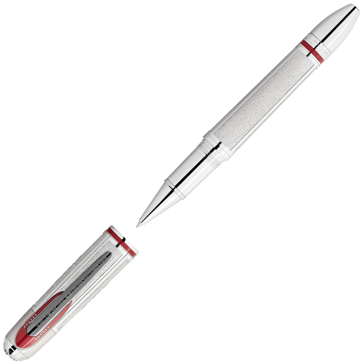The Montblanc Great Characters Enzo Ferrari Limited Edition 1898 Rollerball Pen, a sophisticated silver and white writing instrument with red accents, is displayed with its cap removed. The cap and barrel showcase intricate details, including a red swoosh design and textured grip. Positioned diagonally on a white background, this pen exudes the elegance of Scuderia Ferrari.