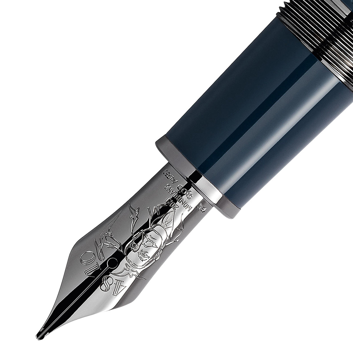 Close-up of the Montblanc Writers Edition Sir Arthur Conan Doyle Limited Edition Fountain Pen nib, showcasing intricate engravings. The metallic nib is paired with a dark blue pen body, capturing the elegance of a tribute to the renowned writer.