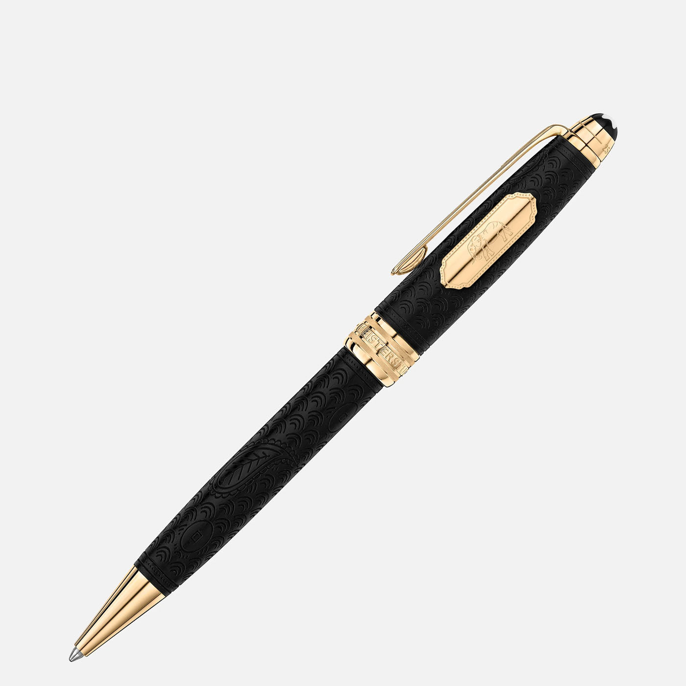 The Montblanc Meisterstück Around The World in 80 Days Solitaire Midsize Ballpoint Pen is a luxurious black pen adorned with intricate designs inspired by Jules Verne's classic work. It features elegant gold accents on the clip, tip, and band, displayed at a diagonal angle against a plain white background.