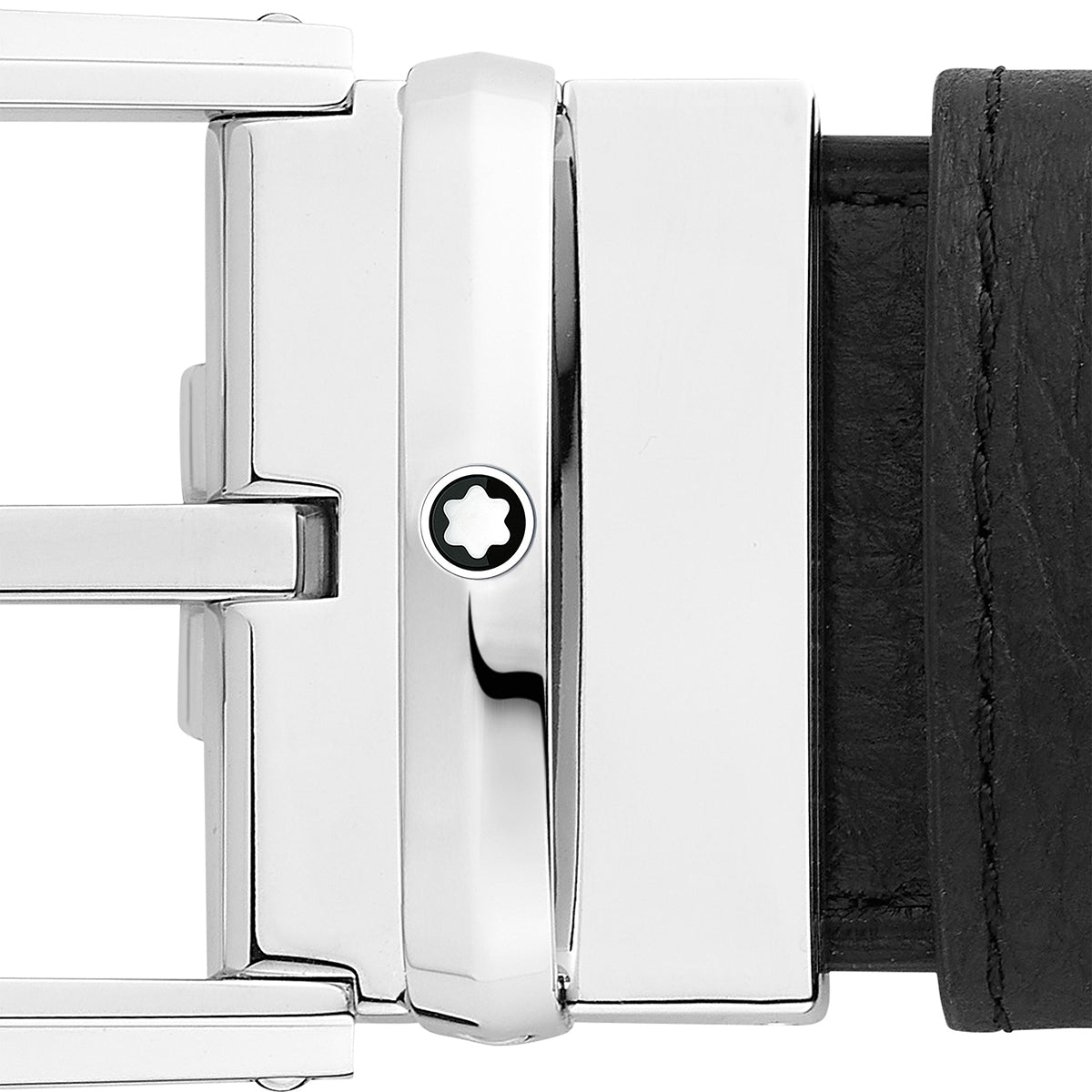 Close-up of the Montblanc Reversible Leather Belt showcasing a glossy stainless steel pin buckle adorned with a star emblem and geometric design elements, paired with a black leather strap on the right side, effortlessly blending style and versatility.