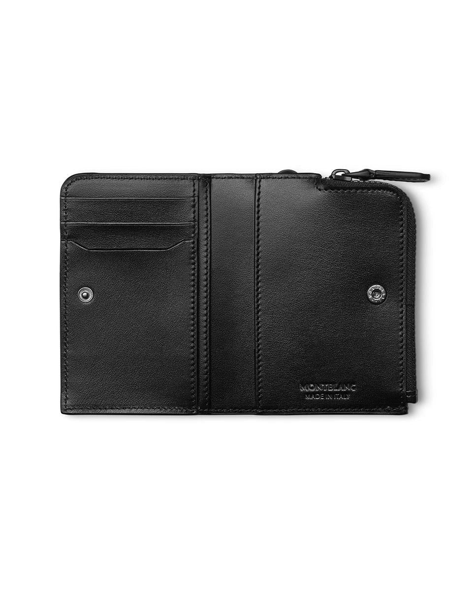 The Montblanc Extreme 3.0 Leather Card Holder 3cc is a black leather card holder with card slots and a zipped pocket, featuring a right-side zipper closure. It includes intricate stitching details along with embossed "Montblanc" branding and "Made in Italy" located on the lower right corner.
