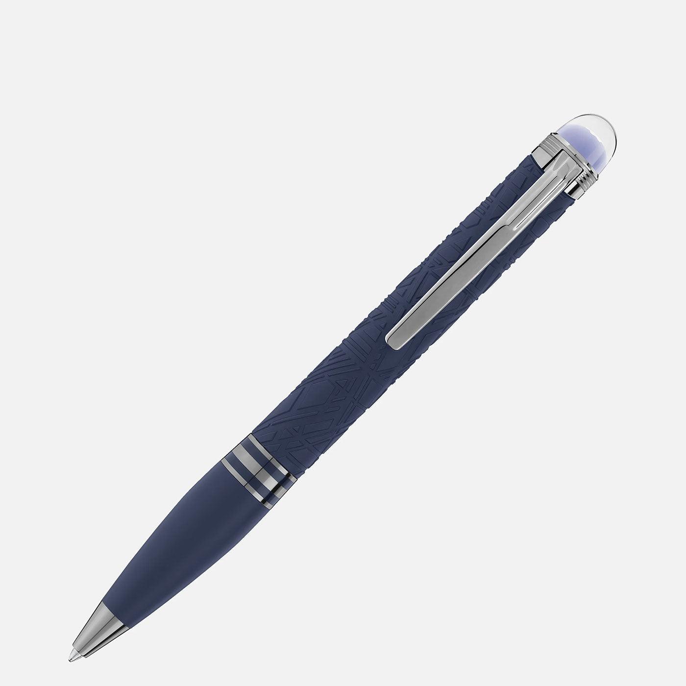 The Montblanc Starwalker SpaceBlue Resin Ballpoint Pen boasts a sleek design in deep space blue, complemented by a textured grip and silver clip. Its modern aesthetic is enhanced by silver accents and topped with a transparent dome, presented against a plain white background.