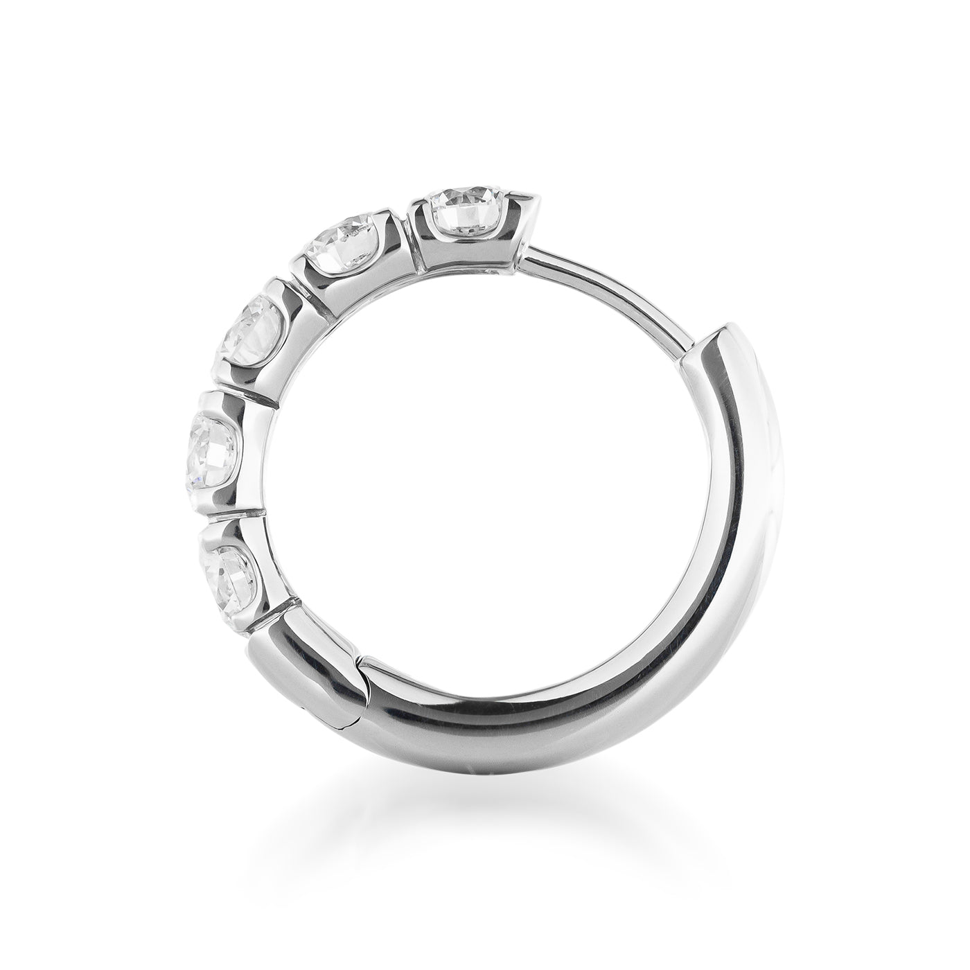The Raffi&Co.® 18K White Gold Diamond Hoop Earrings are a sleek accessory that features a smooth and elegant circular shape, with five embedded diamond-like stones casting a soft shadow against a white background. Designed for piercings, this piece highlights the sophistication of the Raffi&Co brand.