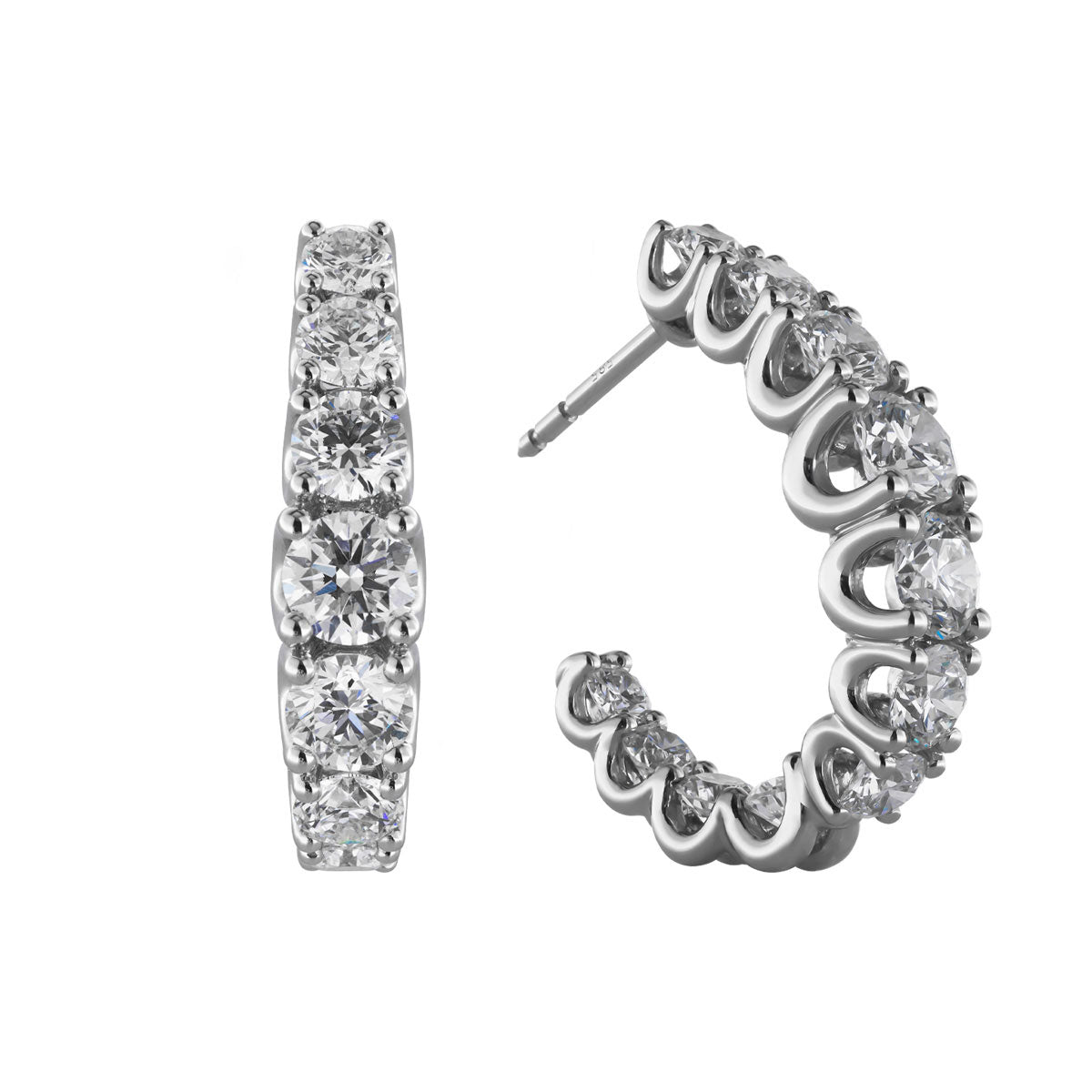Introducing the Raffi&Co.® 14K White Gold Diamond Hoop Earrings, featuring multiple round, sparkling diamonds with VS1-VS2 clarity. One earring is presented from a front view while the other is showcased from a side angle, emphasizing the exquisite stone arrangement.