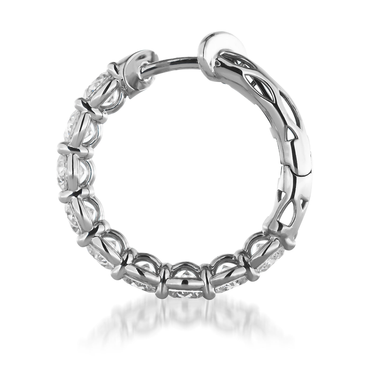 Presenting the Raffi&Co.® 14K White Gold Diamond Hoop Earrings, featuring exquisite detailing and a secure clasp against a pristine white backdrop. The design, crafted to resemble white gold, is adorned with delicate diamond stones along its outer edge for an added touch of sparkle.