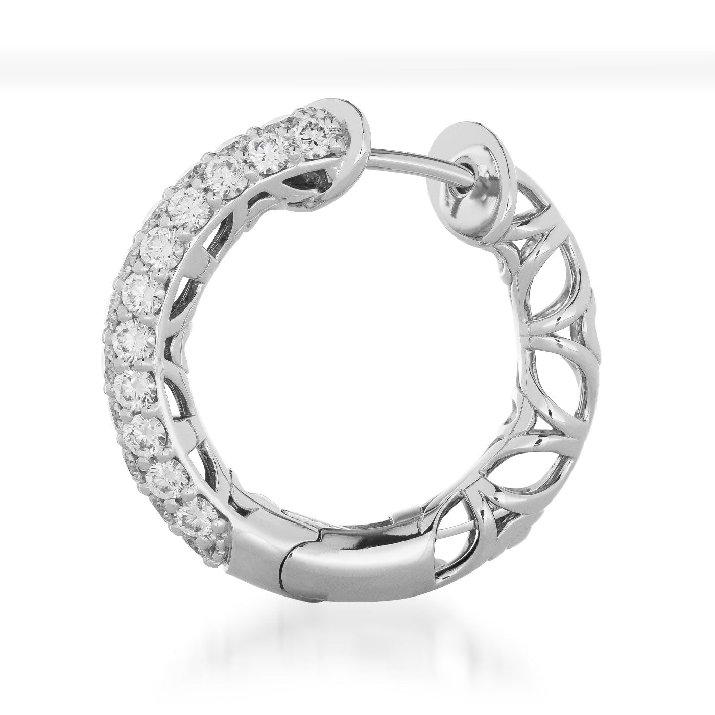 An image showcasing the Raffi&Co.® 14K White Gold Diamond Hoop Earring, adorned with small diamonds along half of its outer surface. The inner section features an intricate cut-out design, crafted in polished white gold for a modern and elegant appearance. The earring is set against a white background.