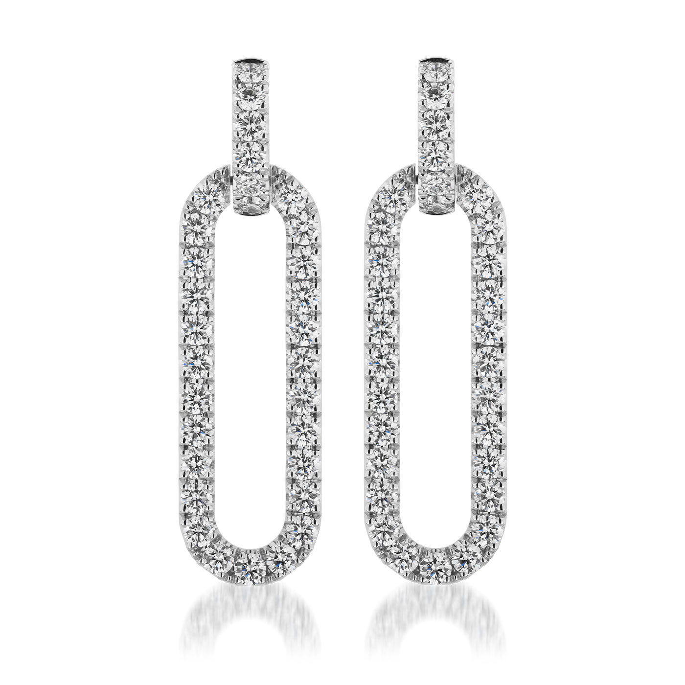 The Raffi&Co.® 14K White Gold Diamond Paper Clip Drop Earrings feature a sleek, modern design with elongated oval shapes encrusted with diamonds. Reflecting light to create a luxurious appearance, these earrings are showcased against a plain white background. They are perfect for those who appreciate the elegance of handcrafted jewelry from Raffi&Co.