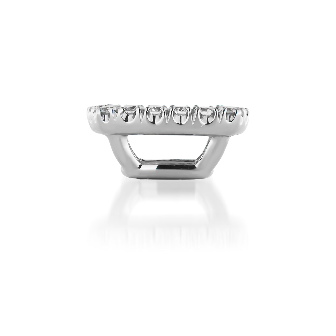 This silver grill for teeth showcases a row of evenly spaced, shiny metal teeth on the top section, complete with a sleek, polished finish and reflective surface. Pair it effortlessly with Raffi&Co.® 18K White Gold Diamond Stud Earring Enhancers for an elegant look.