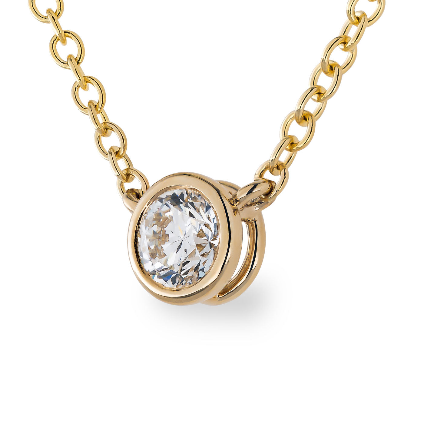 A detailed view of the Raffi&Co.® 14K Yellow Gold Solitaire Diamond Pendant Necklace showcases its round, clear diamond nestled in a gold setting. The polished links emphasize the minimalist design and timeless elegance of this Raffi&Co jewelry piece.