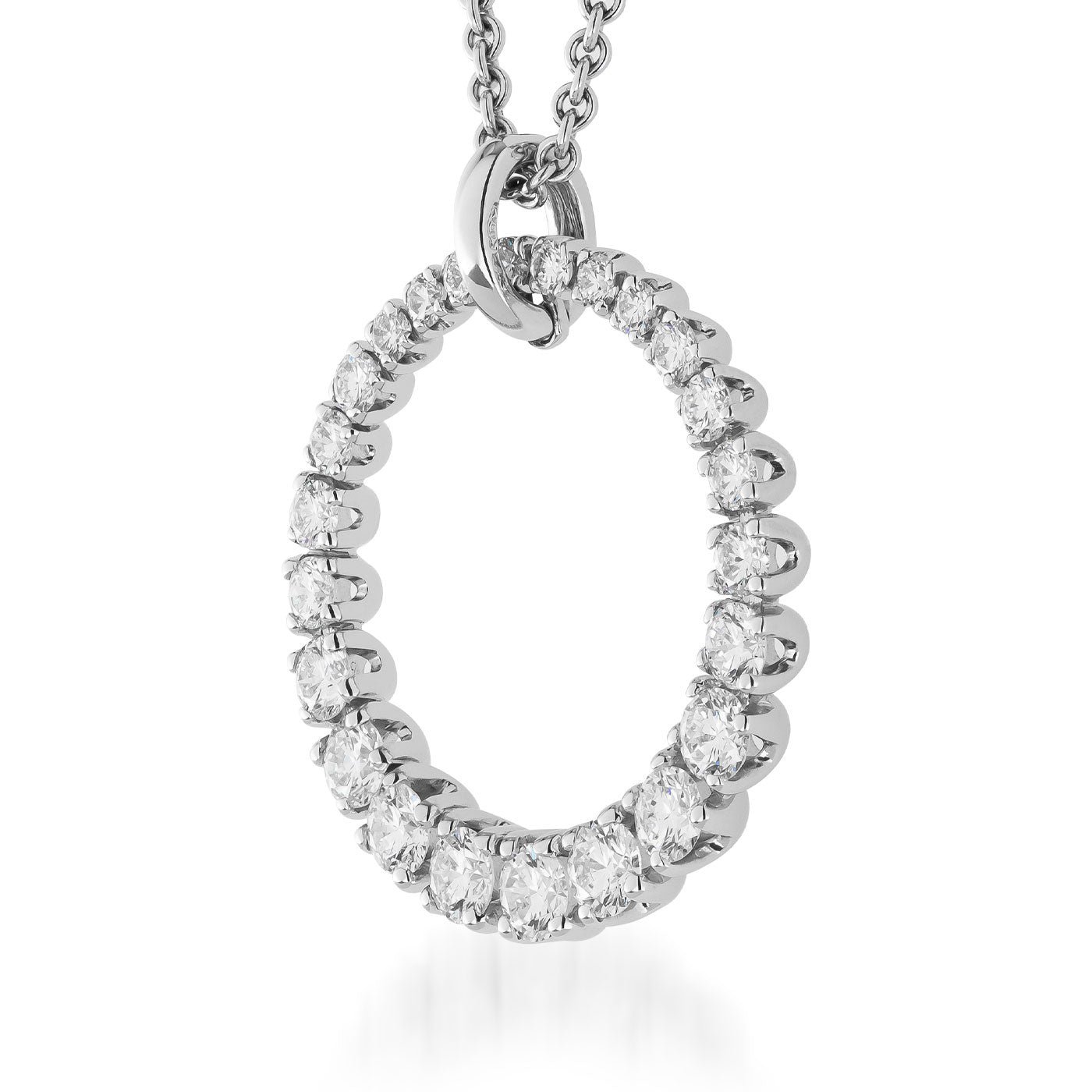 Introducing the Raffi&Co® 18K White Gold Diamond Pendant Necklace. This exquisite piece showcases a circle design with a circular pendant, elegantly crafted in white gold. The necklace is adorned with sparkling gemstones and shiny round stones, creating a luxurious appearance that makes it a breathtaking symbol of jewelry artistry, gracefully hanging from its delicate chain.
