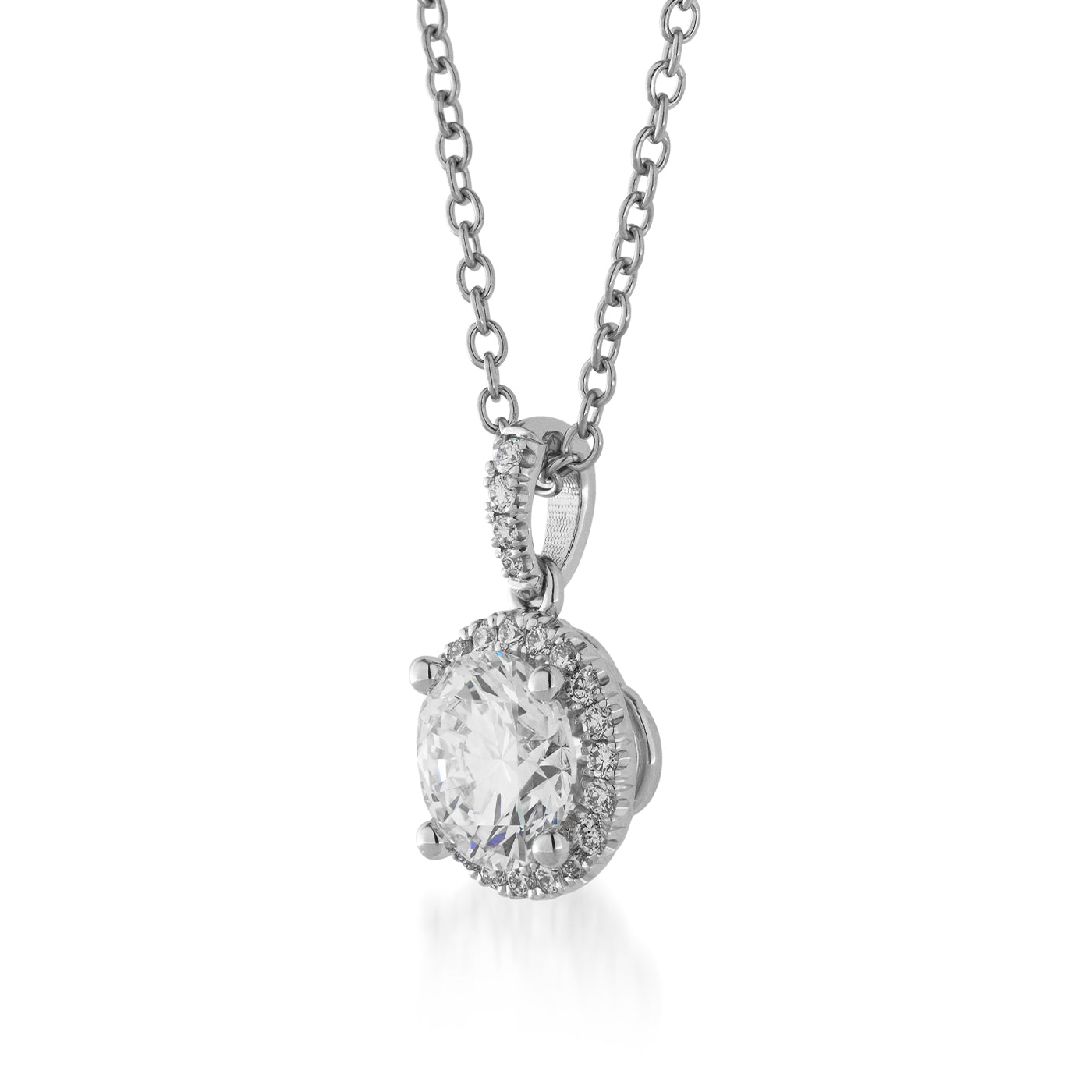Introducing the Raffi&Co.® 14K White Gold Lab Grown Diamond Pendant Necklace, a refined piece from Raffi&Co. featuring a brilliant round lab-grown diamond encircled by smaller dazzling diamonds. This elegant design showcases intricate metalwork and a polished finish, offering stunning sophistication.