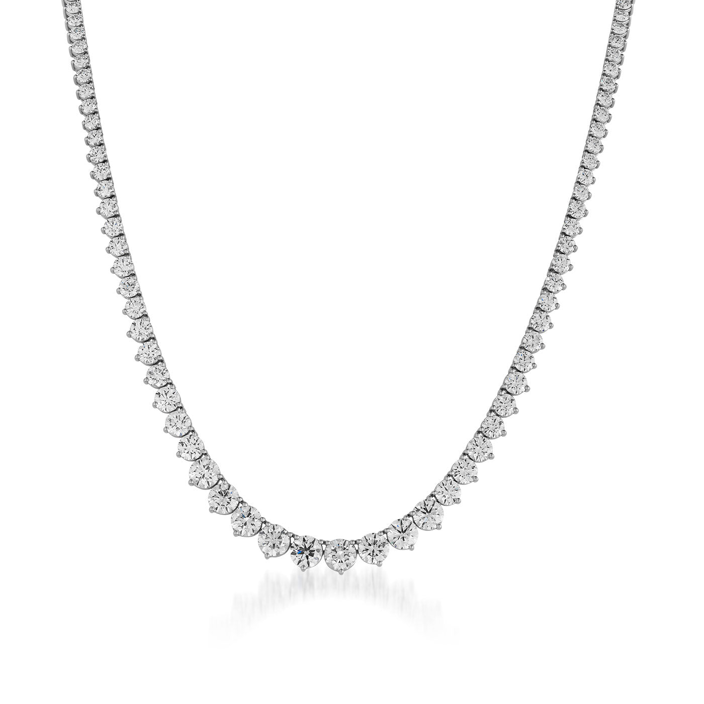 The Raffi&Co.® 18K White Gold Three Prong Diamond Necklace is elegantly displayed in a close-up image, featuring a symmetrical arrangement with diamonds that gradually increase in size toward the center. This luxurious design is set against a plain background, emphasizing its refined three-prong setting and sophisticated craftsmanship by Raffi&Co.