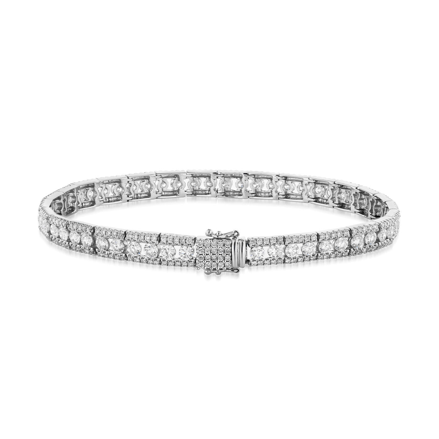The Raffi&Co.® 18K White Gold Diamond Bracelet, encrusted with small round diamonds and featuring a sleek clasp design, is beautifully positioned against a plain white background, showcasing its luxurious sparkling appearance.