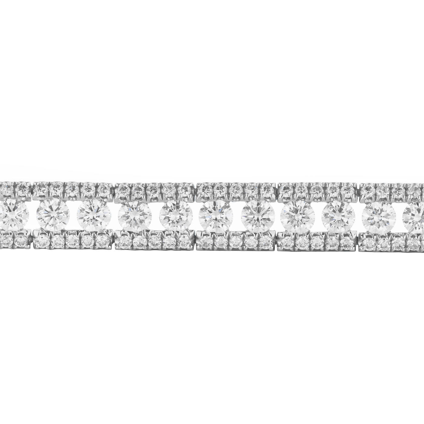 A close-up image of the Raffi&Co.® 18K White Gold Diamond Bracelet showcases two rows of round-cut diamonds set in a luxurious white gold band. The closely arranged diamonds create a seamless and elegant appearance.