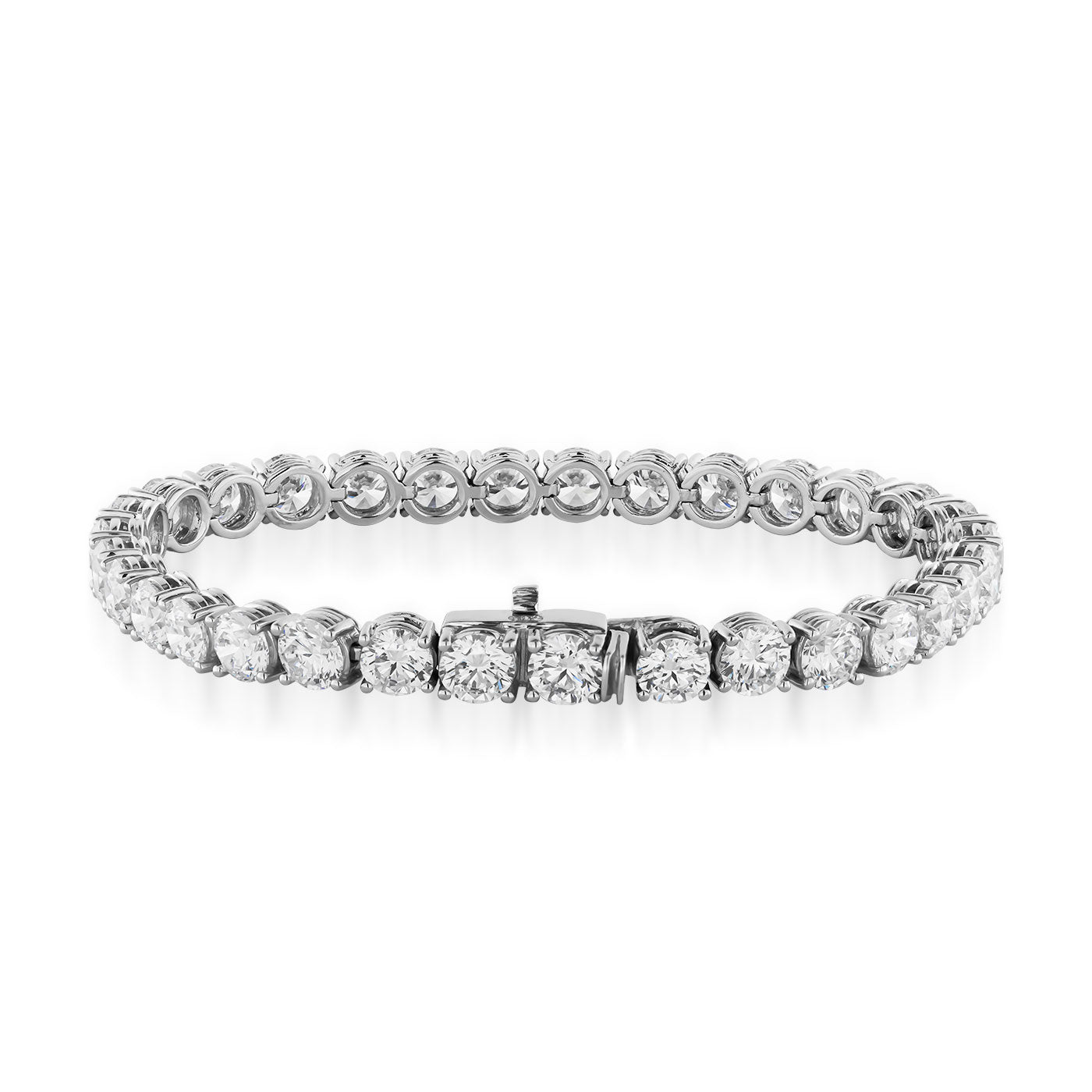 The Raffi&Co.® 18K White Gold Diamond Tennis Bracelet, featuring round-cut diamonds with a total weight of 13.70 carats, boasts a secure clasp and exquisite sparkle. Its elegance and luxurious design are accentuated against a white background.