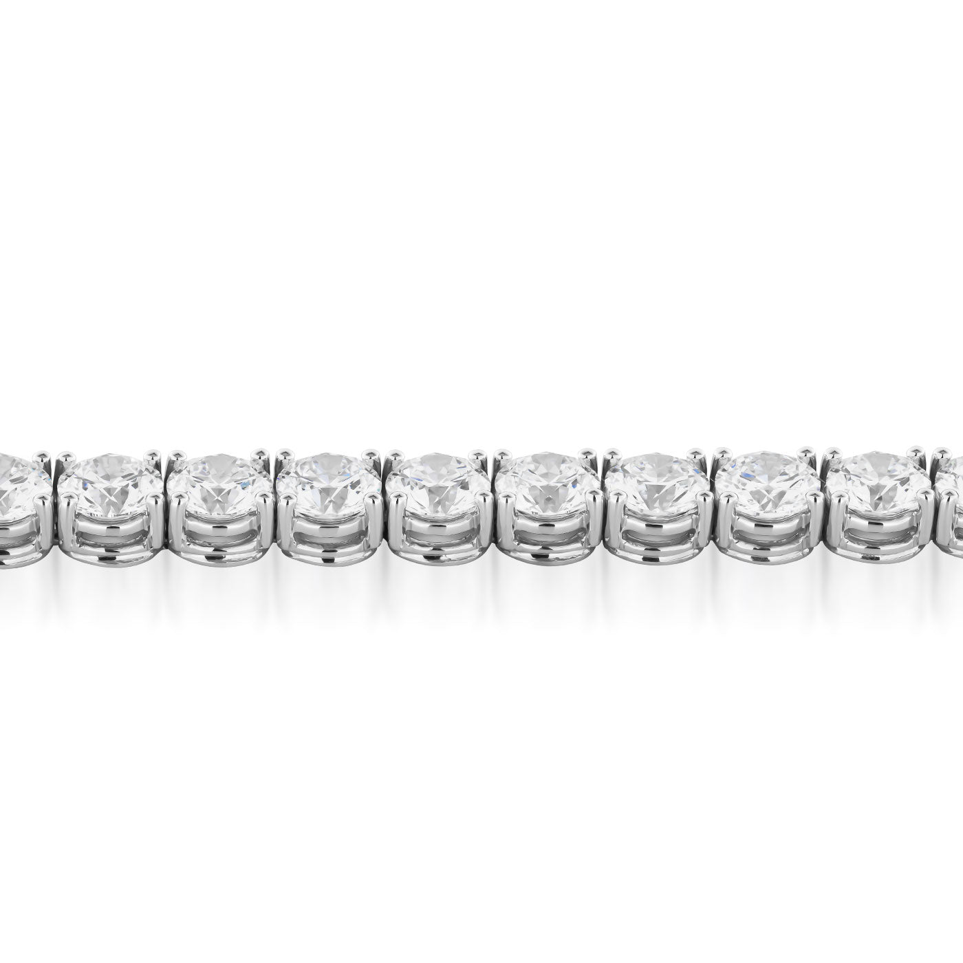 A close-up of the Raffi&Co.® 18K White Gold Diamond Tennis Bracelet showcases a row of round, sparkling gemstones set in individual prong settings. The sleek design enhances the brilliance of the 13.70 carats diamonds, creating an elegant and timeless piece by Raffi&Co.