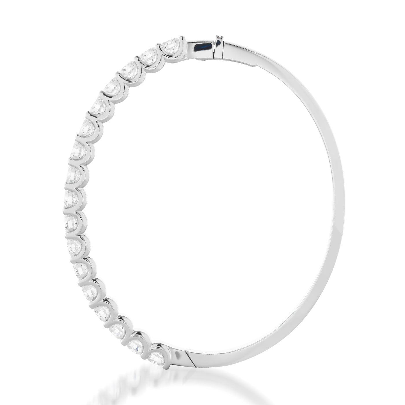 The Raffi&Co.® 14K White Gold Round Brilliant Diamond Bangle is a sophisticated piece featuring a sequence of round, dazzling diamonds along one side for an uninterrupted shimmering effect. Elegantly crafted to capture light, this luxurious statement piece embodies refined elegance.