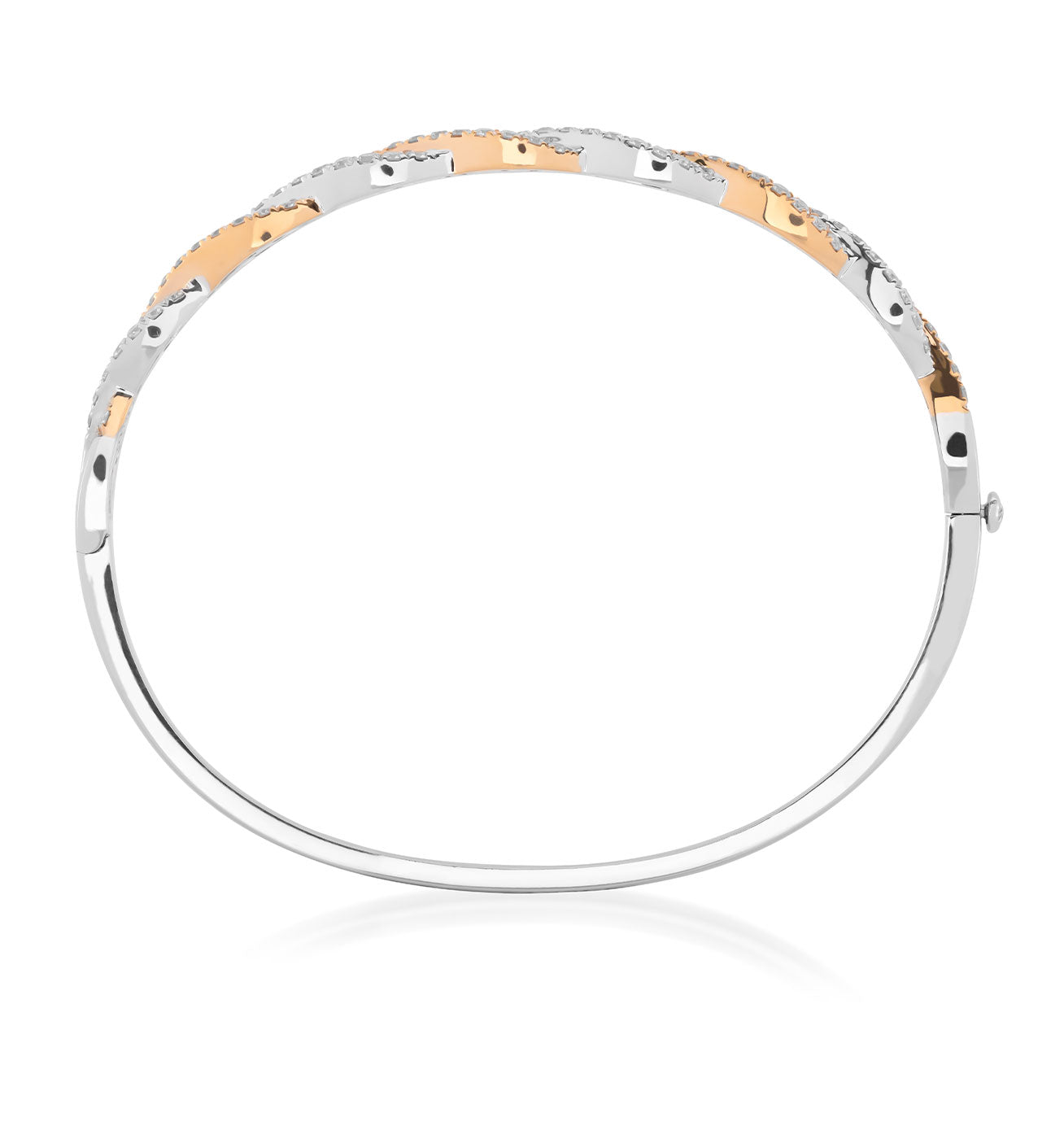 This contemporary bangle boasts silver and gold tones with a dotted texture and side clasp, offering versatile style reminiscent of the Raffi&Co.® 18K White & Rose Gold Diamond Bangle by Raffi&Co.