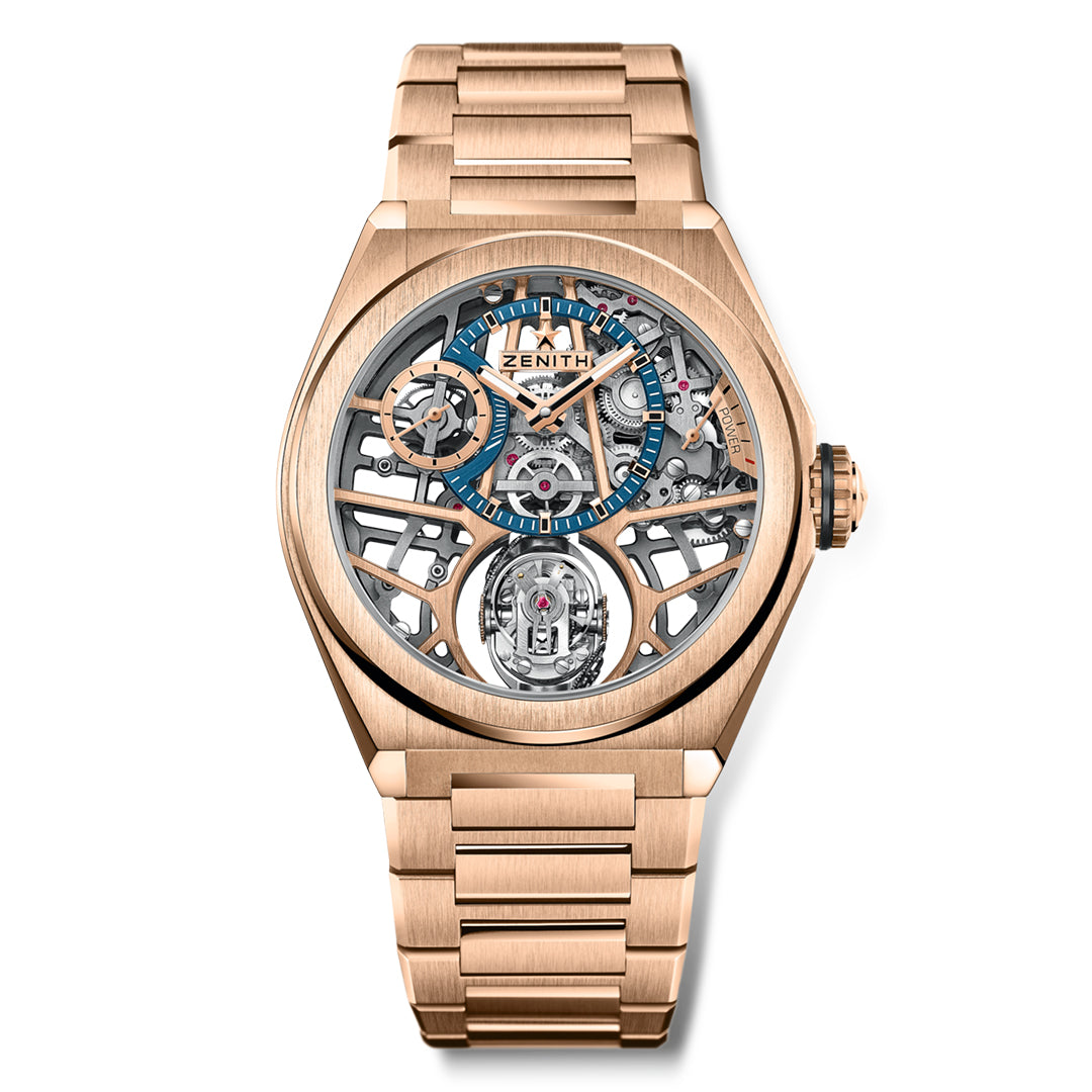 Discover the Zenith Defy Skyline Elite 670, a luxury skeleton watch embellished with a rose gold case and bracelet. The intricate dial reveals blue/silver mechanics, while its diamond-set faceted bezel offers an elegant touch to this Zenith masterpiece.