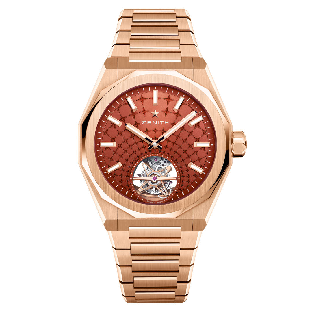 The Zenith Defy Skyline Tourbillon El Primero 3630 41mm watch features a rose gold case, patterned red dial with gold markers and hands, an exposed mechanism at 6 o’clock, matching bracelet, and the Zenith logo on the dial.