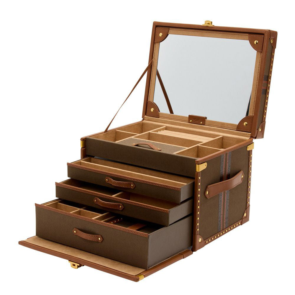 The exquisite WOLF 1834 Ida Trunk Jewellery Box, crafted from luxurious brown leather and featuring a custom-designed lock with brass stud detailing, is open to display its velvet-lined drawers and a large mirror on the inside of the lid.