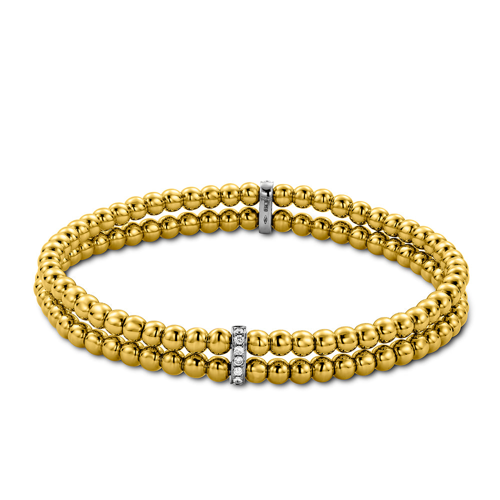 The Hulchi Belluni Tresore 18K Yellow Gold Diamond Bracelet features double strands with polished gold beads and two silver spacers set with 0.20 CTW round brilliant diamonds for a sleek, elegant look.