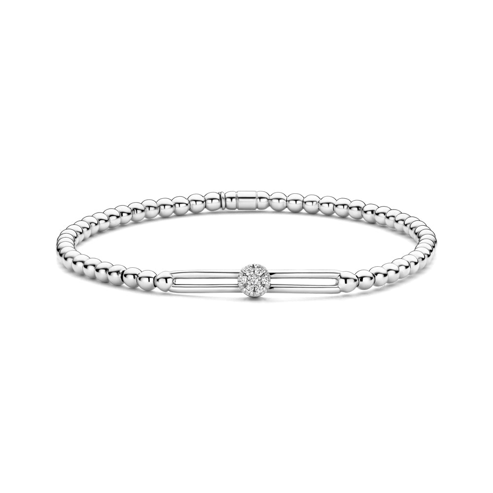The Hulchi Belluni 18K White Gold Diamond Bracelet features a minimalist beaded design with a polished finish and a central round brilliant diamond accent of SI-VS clarity.